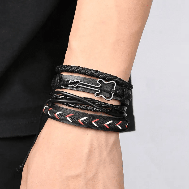 Stylish BLACKFIRE KNOT - Leather Bracelet for Men 4 pcs Genuine Braided Leather Bracelet Set for Men on display.